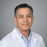 Retrato ilustrativo de Dr. Carlos Mendoza